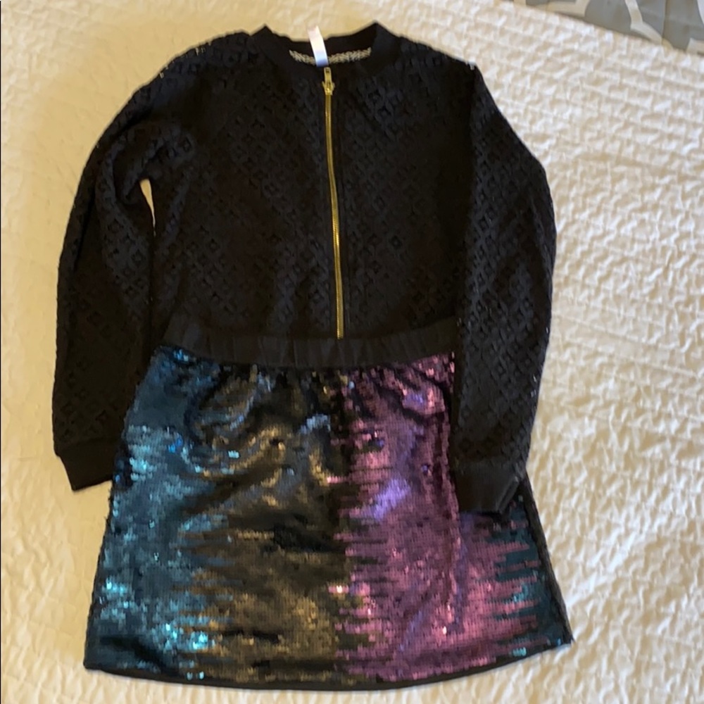 Black jacket and sequin skirt
